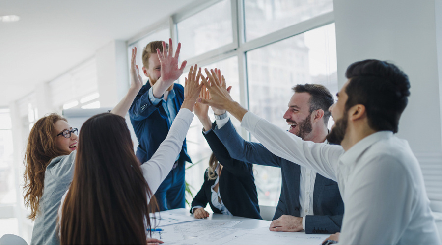 Team giving each other high fives